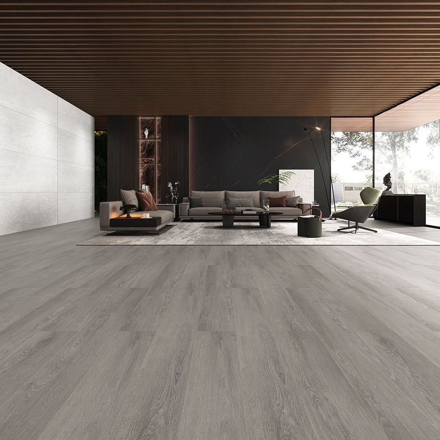 Open-plan living space with grey-toned timber-look hybrid flooring